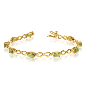 14K Yellow Gold Oval Peridot Stones And Diamonds Infinity Tennis Bracelet, 7"