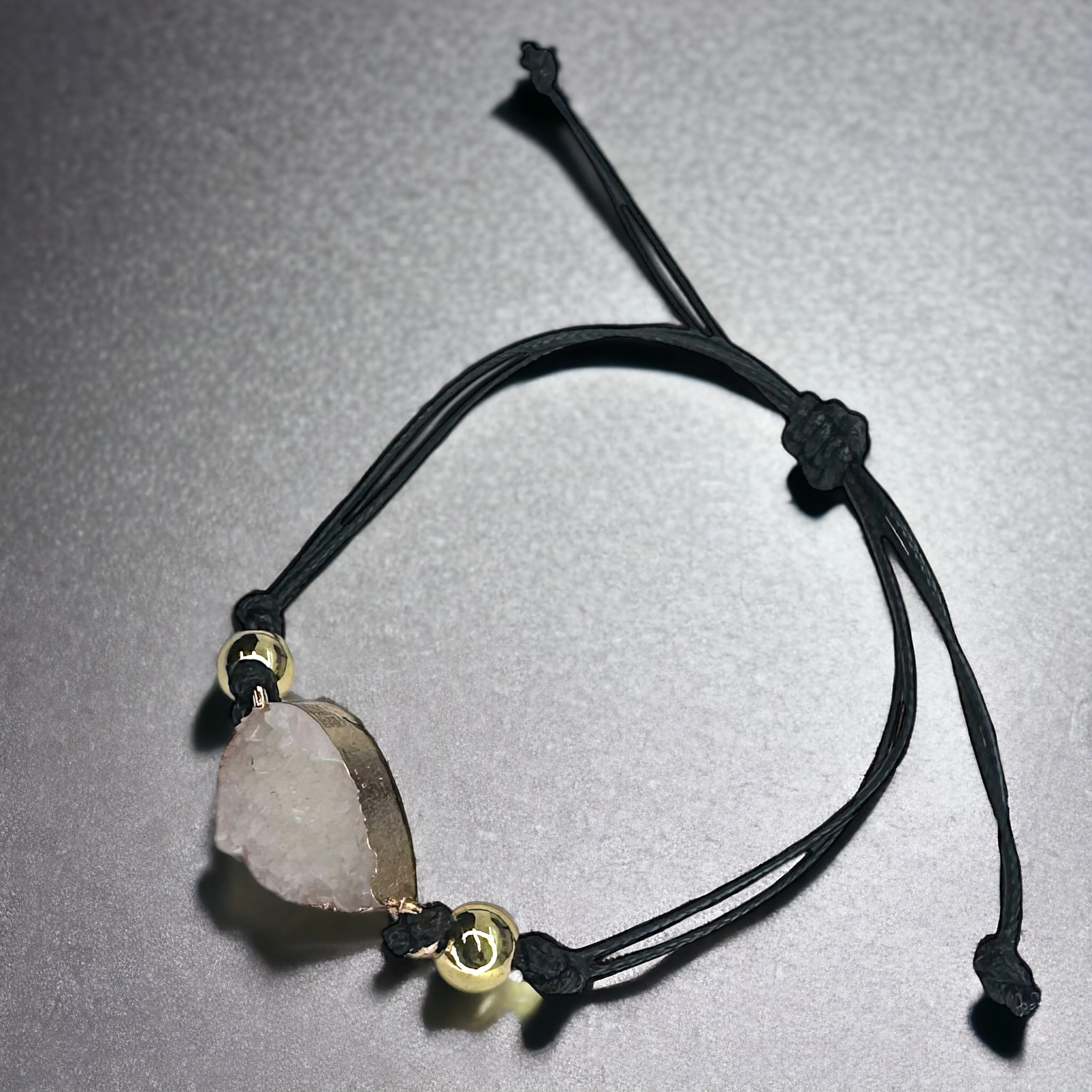 Black Leather Bracelet with Gold and White Charm