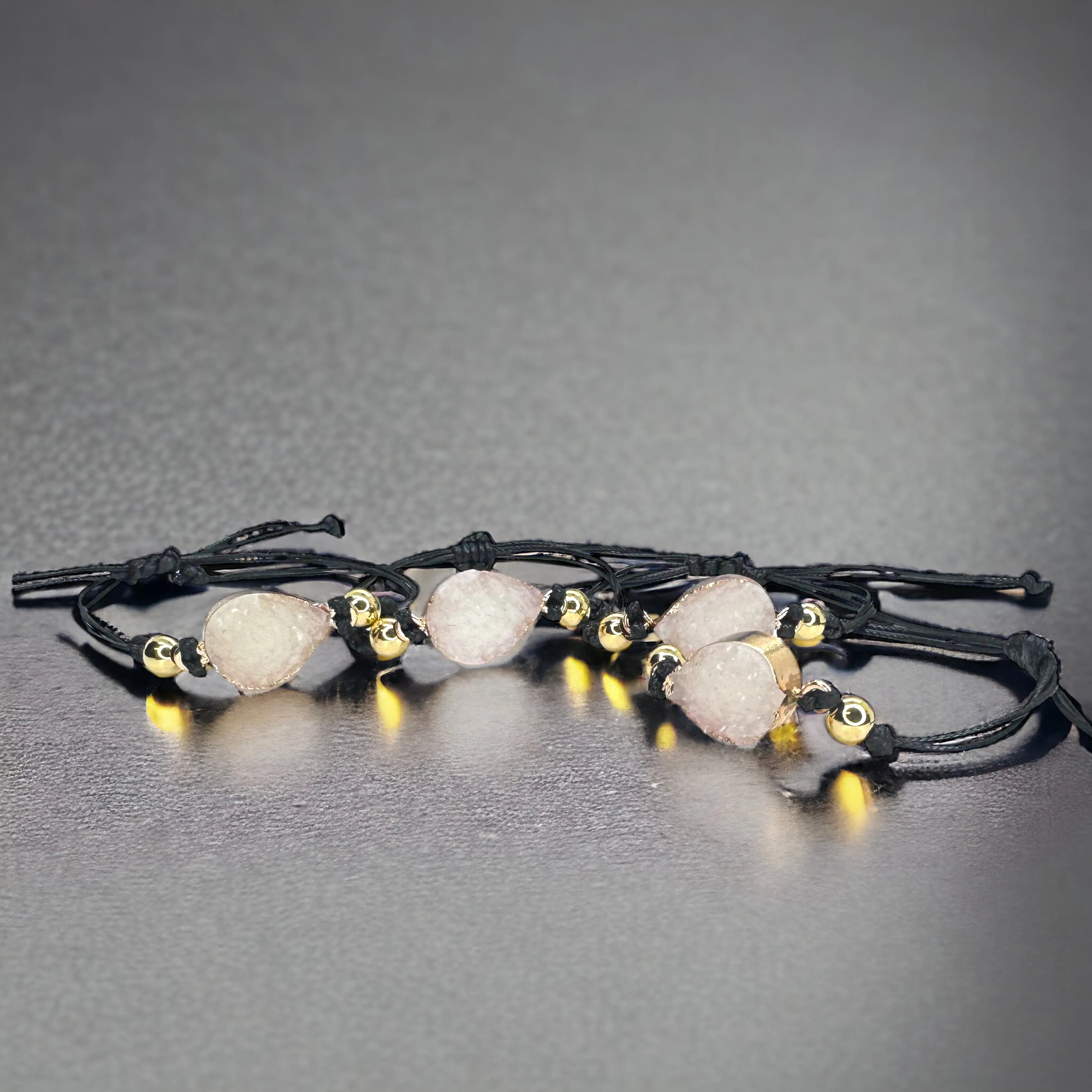 Black Leather Bracelet with Gold and White Charm