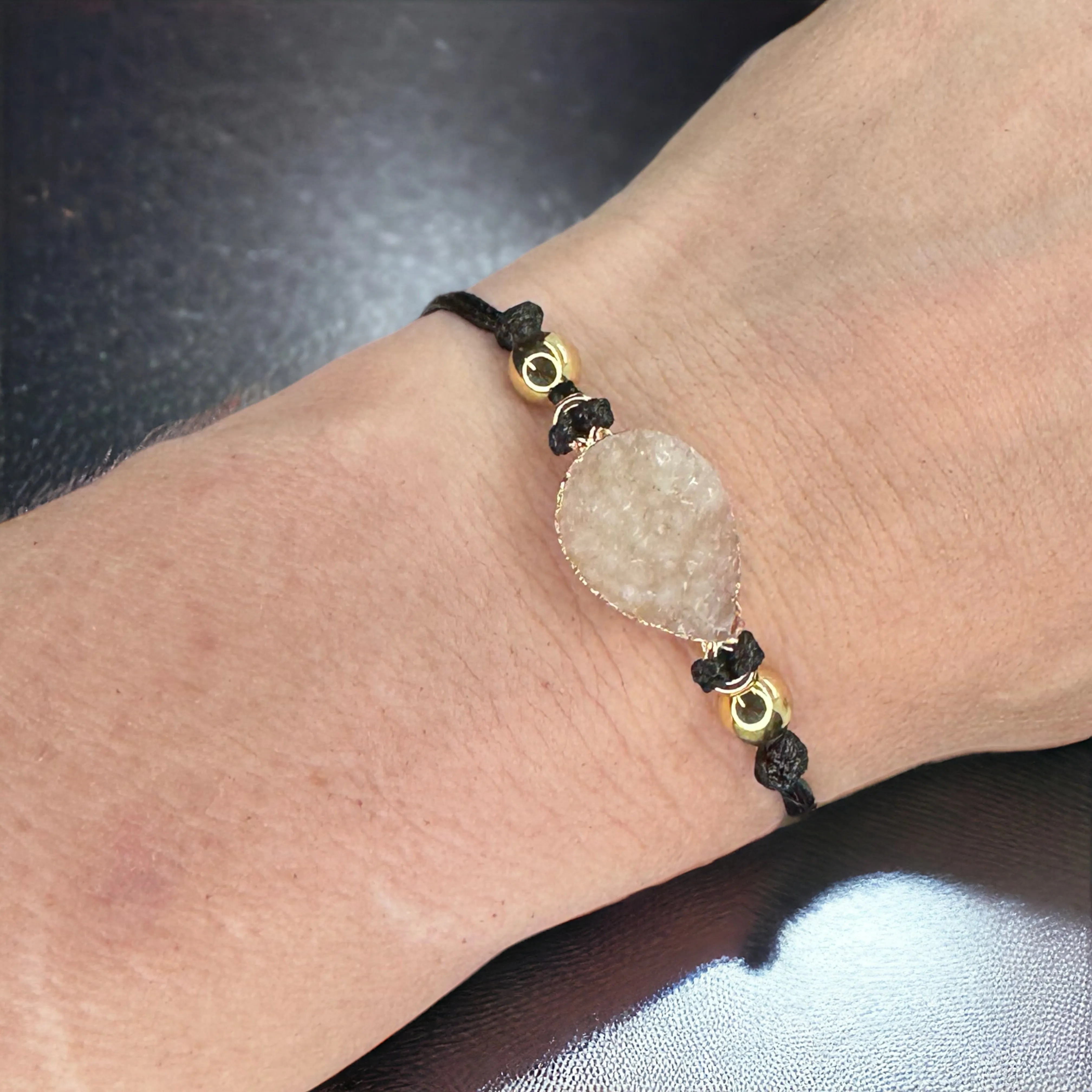 Black Leather Bracelet with Gold and White Charm