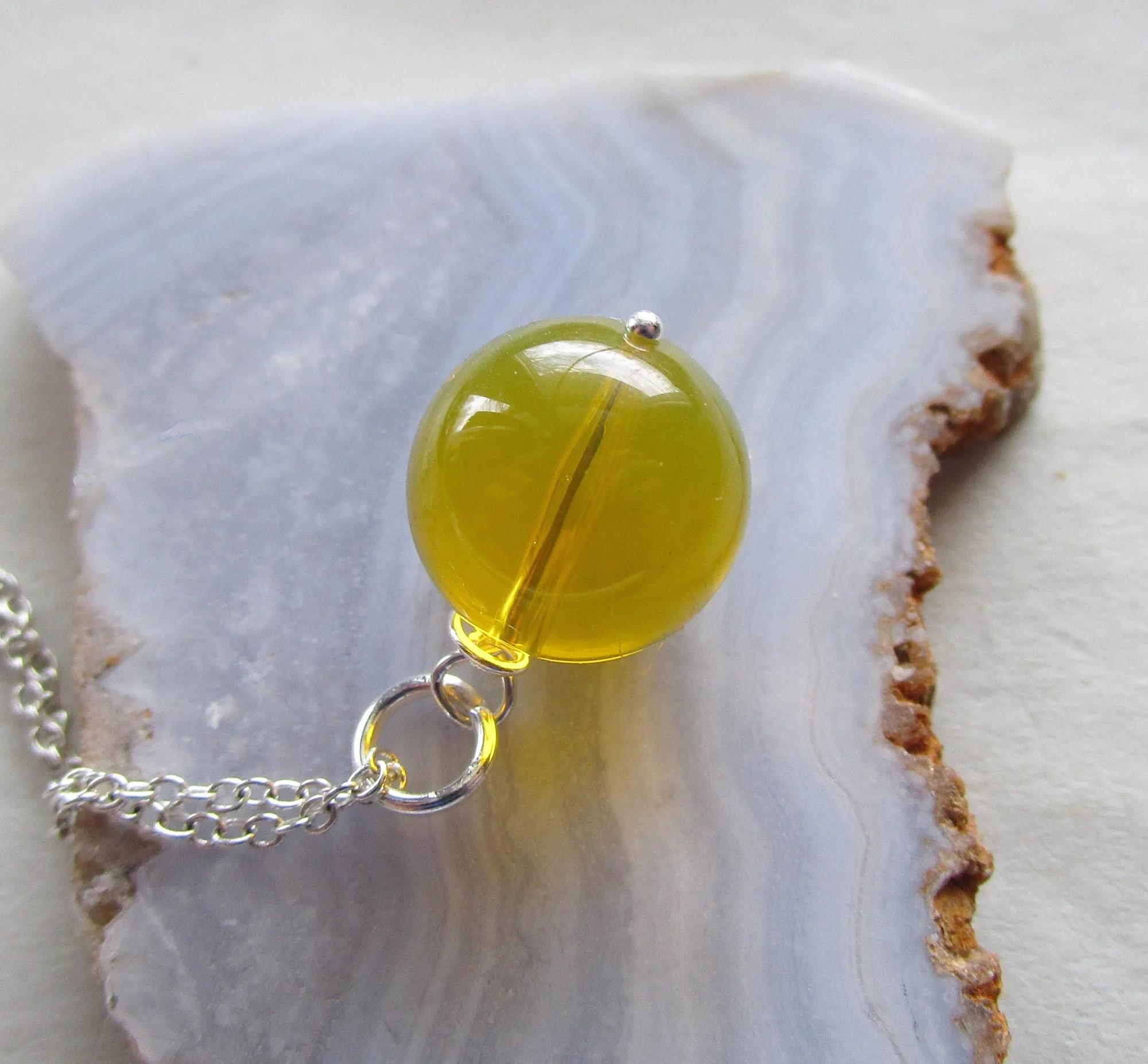 Dominican Blue Amber Bead Sphere Pendant Necklace