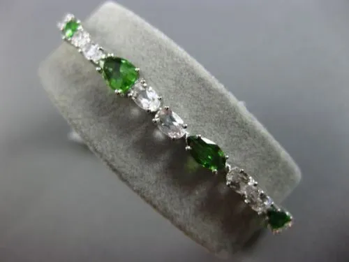 ESTATE 10.19CT PERIDOT & WHITE QUARTZ 18K WHITE GOLD MULTI SHAPE TENNIS BRACELET