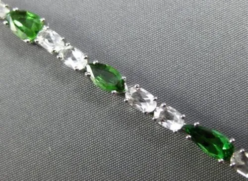 ESTATE 10.19CT PERIDOT & WHITE QUARTZ 18K WHITE GOLD MULTI SHAPE TENNIS BRACELET