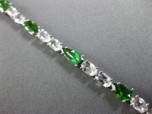 ESTATE 10.19CT PERIDOT & WHITE QUARTZ 18K WHITE GOLD MULTI SHAPE TENNIS BRACELET