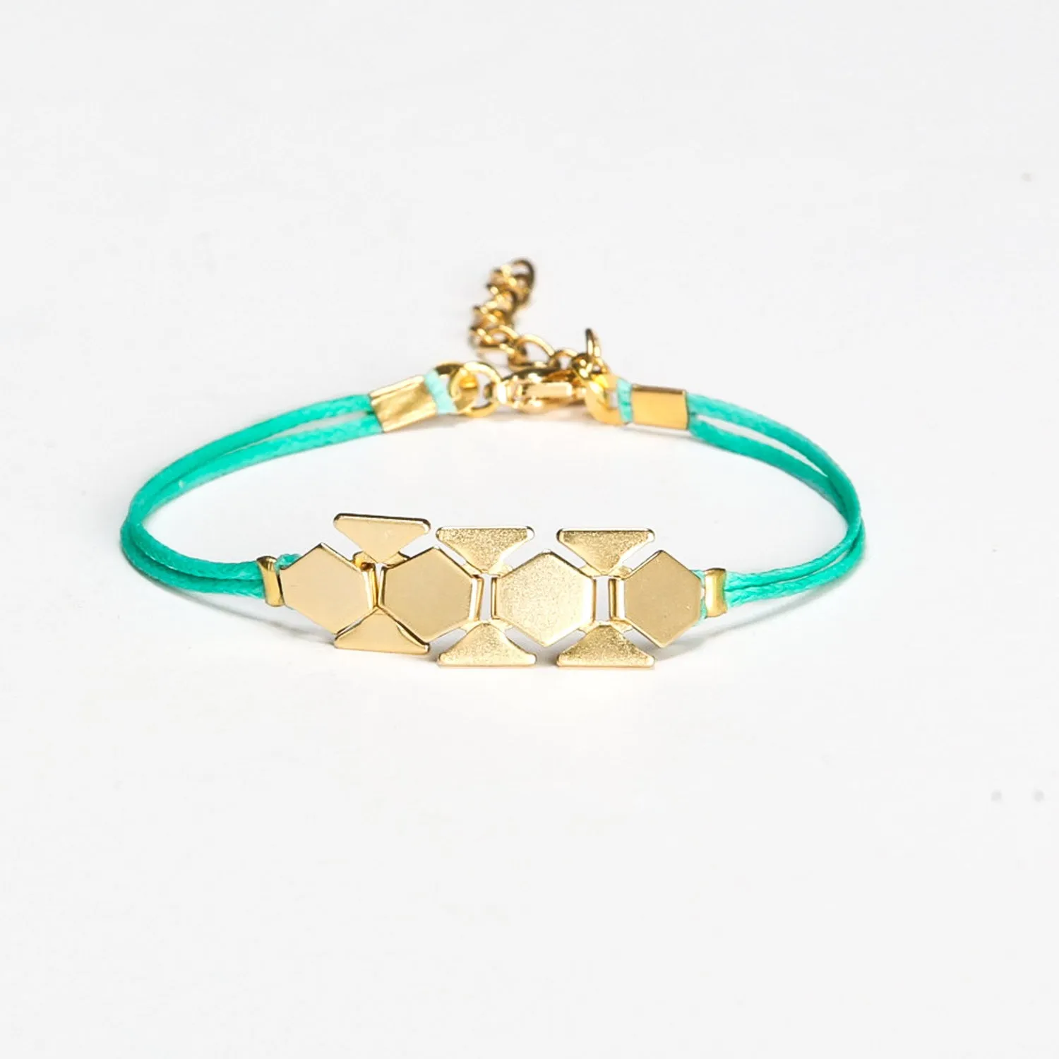 Turquoise cord bracelet with a gold chunky flat chain